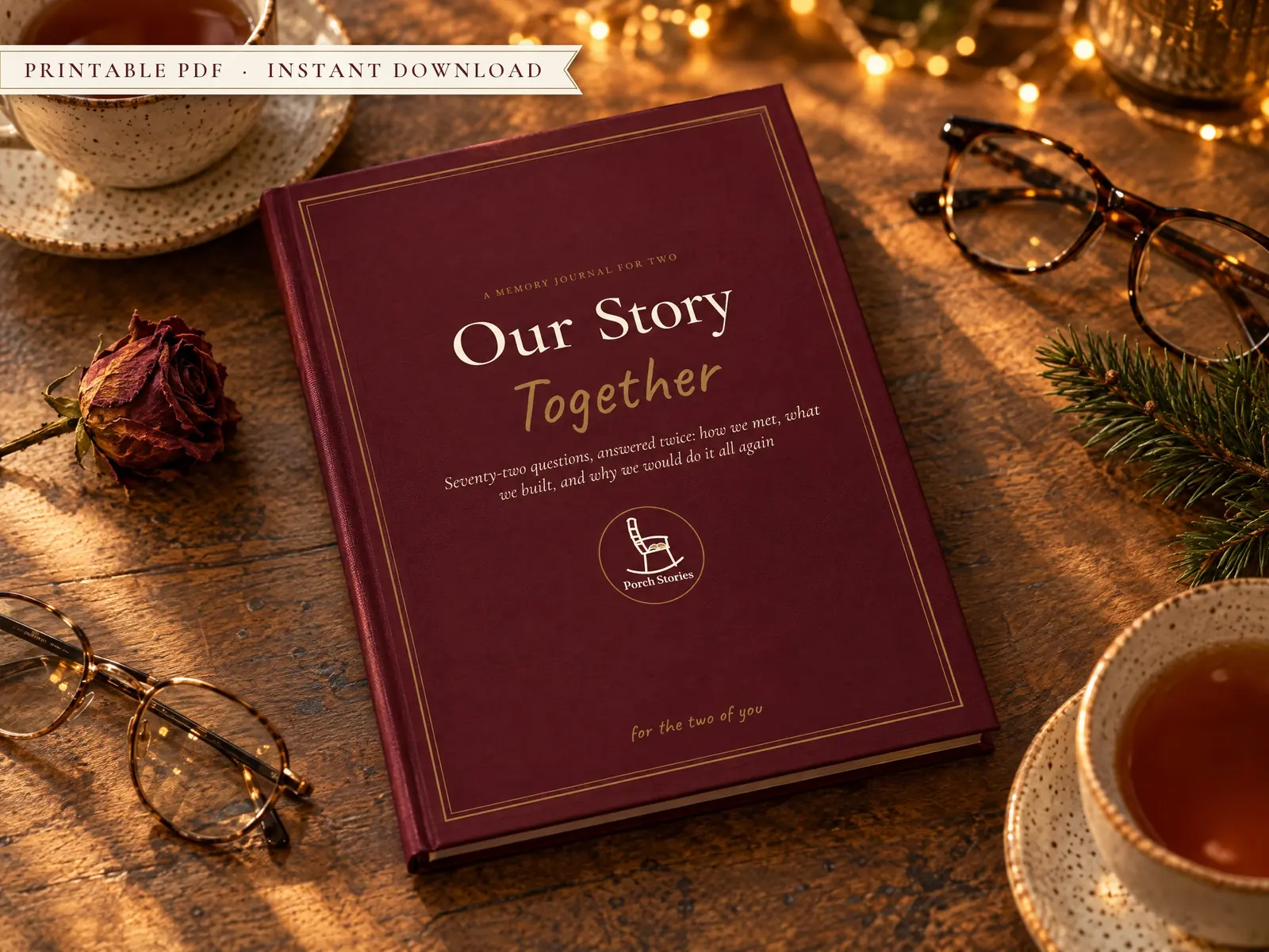 Our Story couple journal on a wooden table with two cups of tea