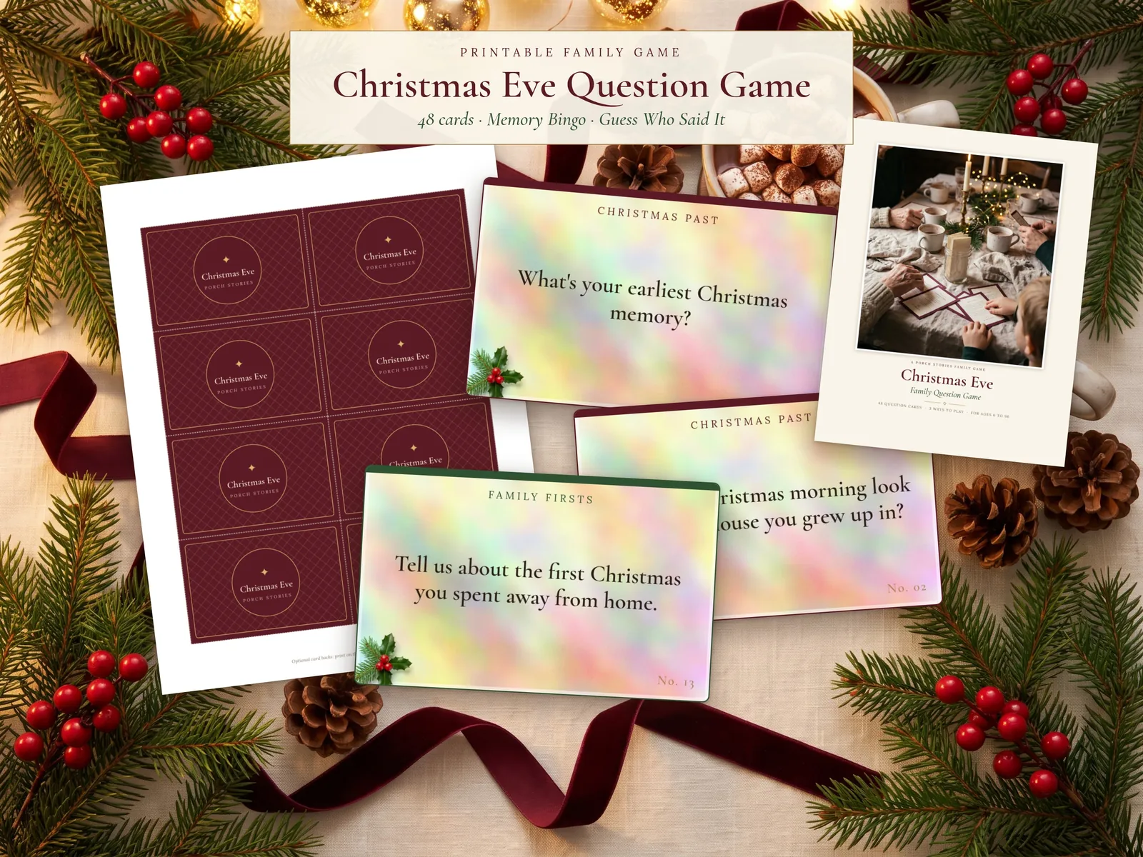 Christmas Eve Question Game: printed question cards, card backs and the keepsake page on a festive table